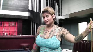 Milf with tattooed body and many clit piercings